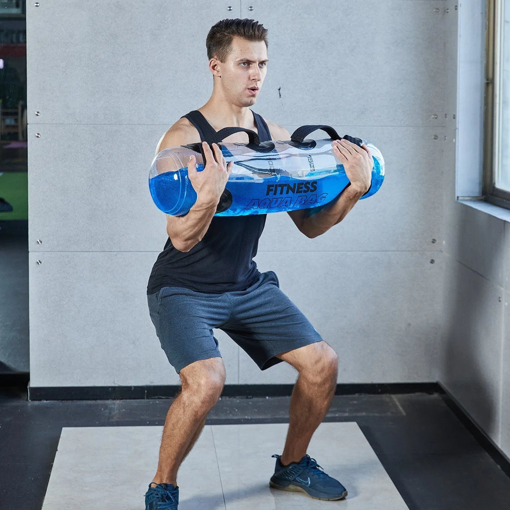 Transparent PVC water injection dumbbell bag showing adjustable weight system for portable strength training
