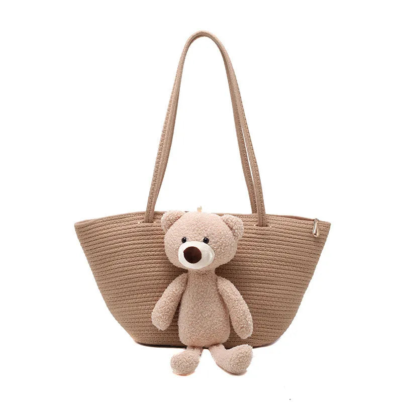 Woven cotton linen dumpling-shaped bag with three-dimensional pocket in khaki colour