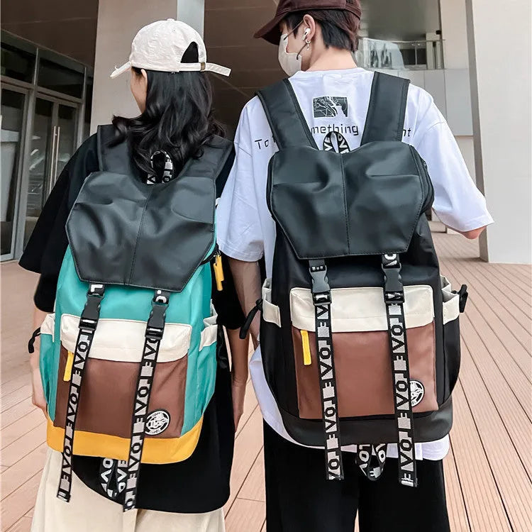 Oxford cloth backpack in black showing handheld, shoulder, and dual-strap carrying options.