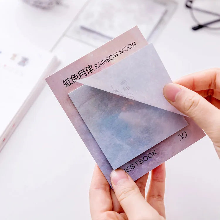 Square planet sticky notes notepad showing astronomical oil painting designs including various planetary imagery