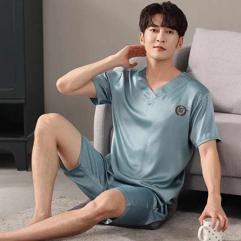 Man's ice silk pajama set showing loose short sleeve shirt and matching shorts in a solid colour.