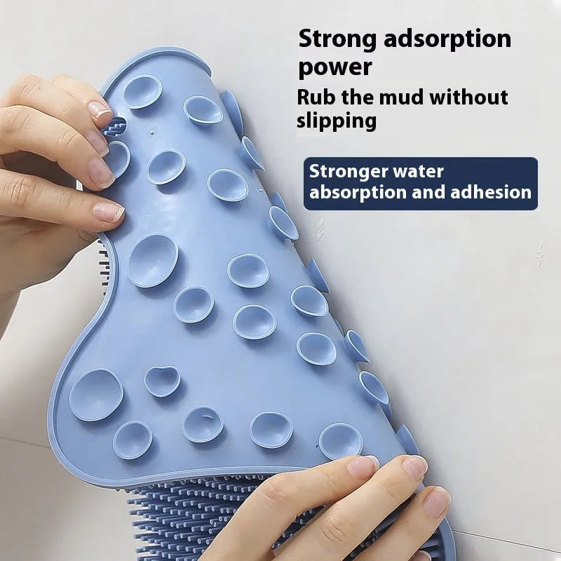 Blue silicone bath brush cushion mat for skin scrubbing measuring 31cm by 32cm