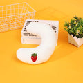Blue U-shaped half moon cartoon pet pillow for a cat or small dog on a floor.