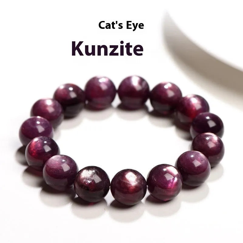 Purple lepidolite polished crystal round bead bracelet on a wrist, showing single circle design.