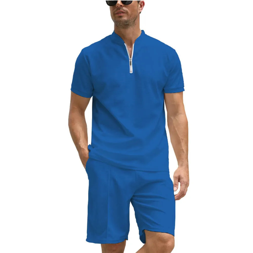 Men's solid colour short sleeve polo shirt and trousers two-piece set on a hanger.