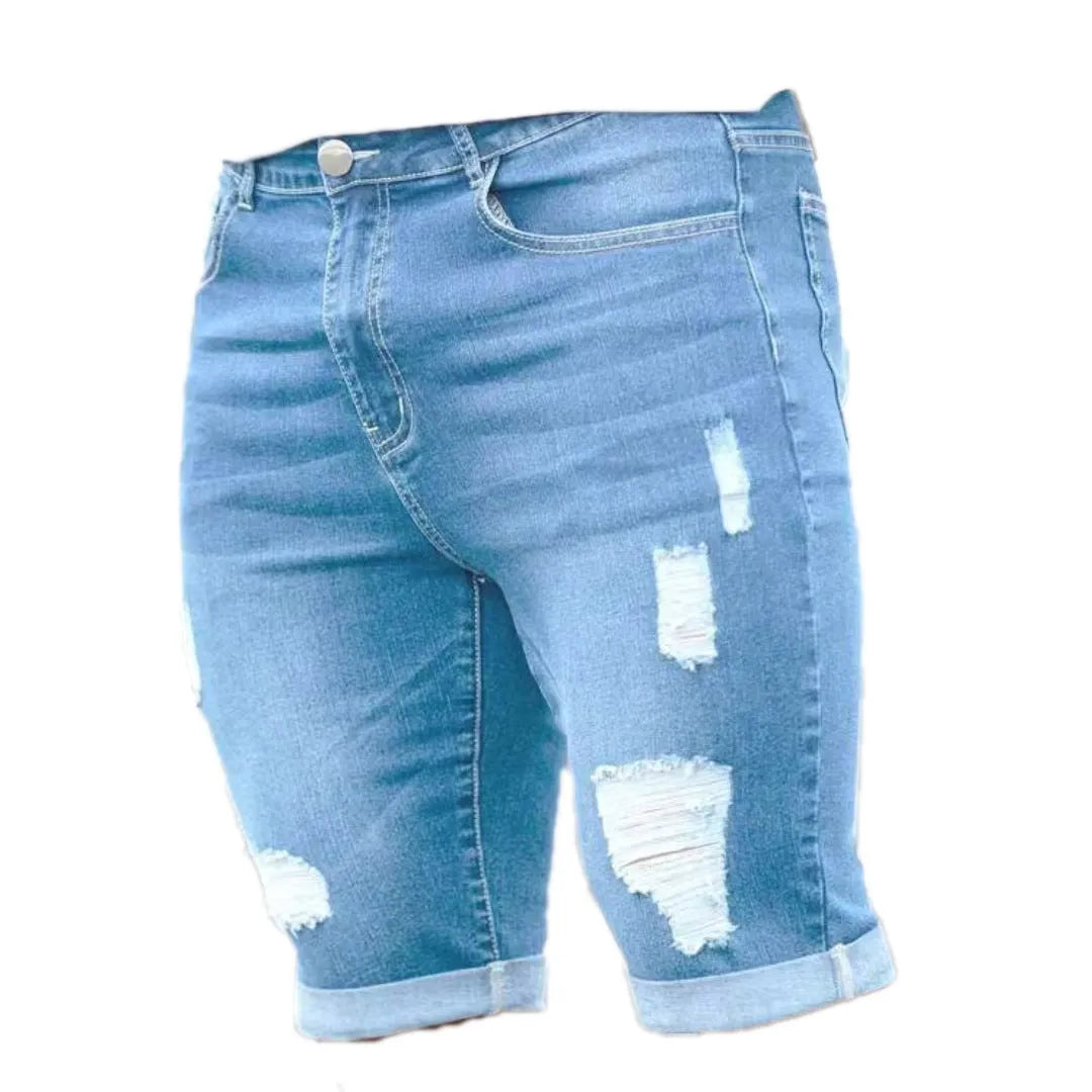 Sky blue men's denim shorts with a multi-hole distressed design on the front, showing a low waist and straight leg cut.