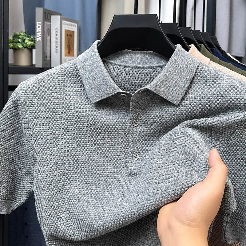 Loose fitting short sleeve cotton pullover sweater in a solid colour on a hanger