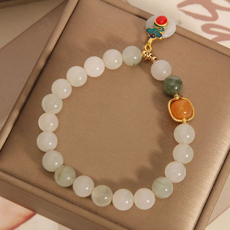 Women's adjustable ice jade bracelet with pearl accents and xiangyun jade buckle