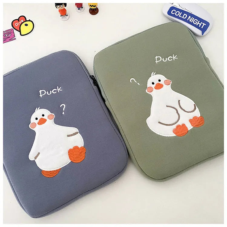 Blue cotton tablet case with duck embroidery design and zipper closure for 11-inch to 16-inch tablets