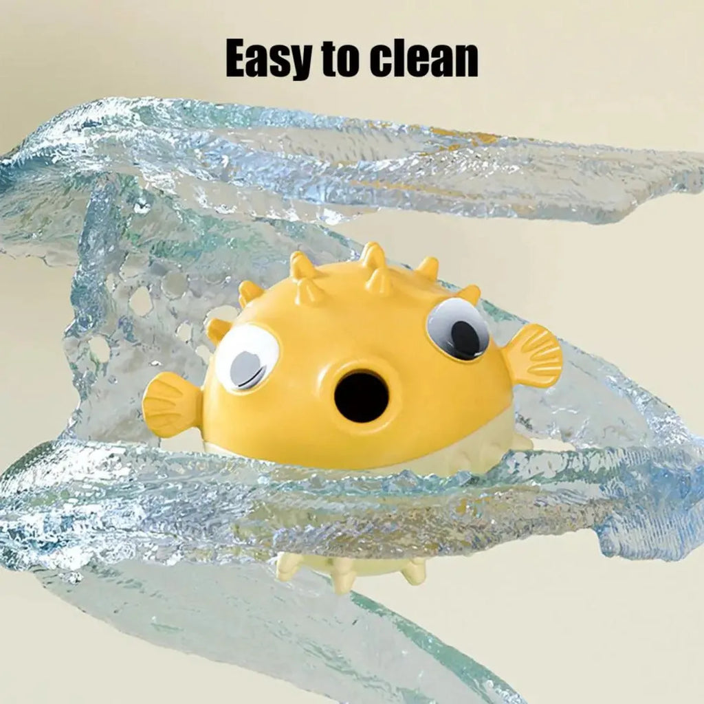 Yellow vinyl fish-shaped dog chew toy with textured surface for aggressive chewers