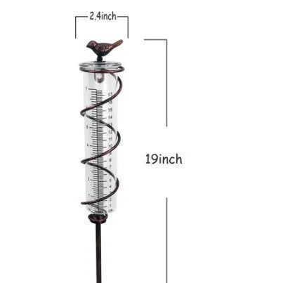 Cast iron hummingbird decoration garden rain gauge with glass measurement tube showing 1-20 scale