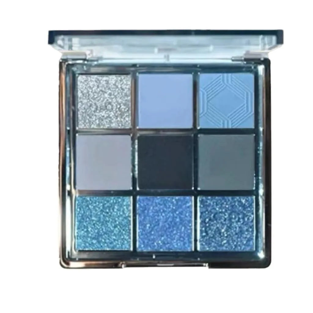 MUGELEEN nine-colour eye shadow palette showing low saturation blue smoked shades with matte and shimmer finishes