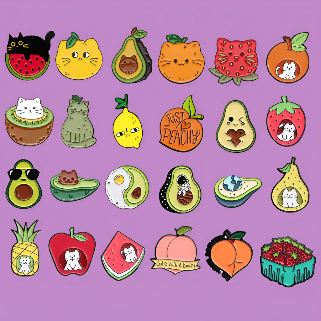 Colourful cartoon fruit design metal brooch pin with a letter shape on a white background.