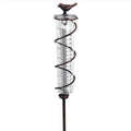 Cast iron hummingbird decoration garden rain gauge with glass measurement tube showing 1-20 scale