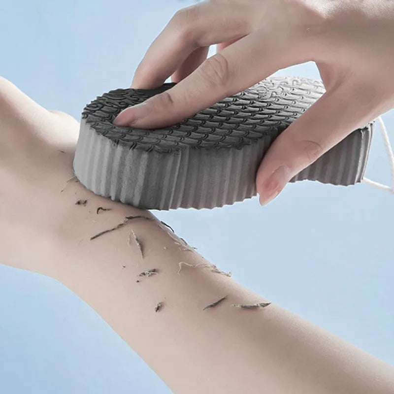 3D white bath sponge with fish scale pattern for gentle body exfoliation.