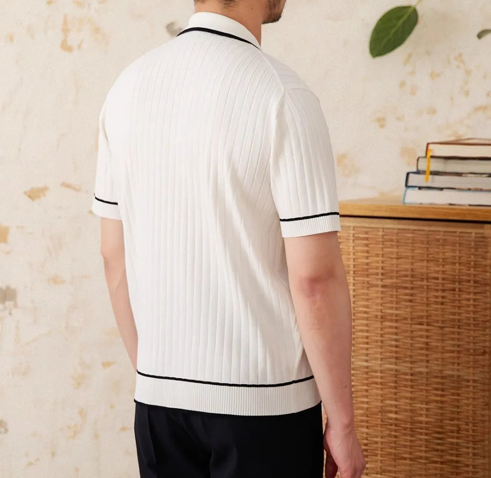 Men's slim fit black lapel polo shirt with short sleeves on a hanger