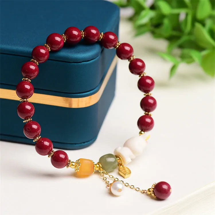 Traditional Chinese cinnabar bracelet with rabbit charm in 8mm or 10mm bead sizes