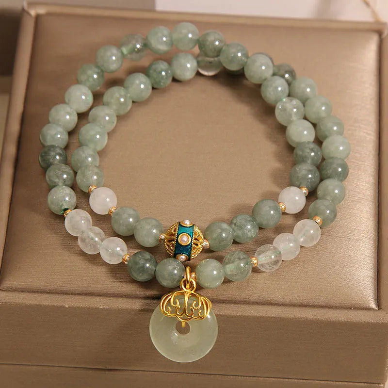Aventurine double-layer jade bracelet with rhinestone accents and peace buckle closure in emerald green