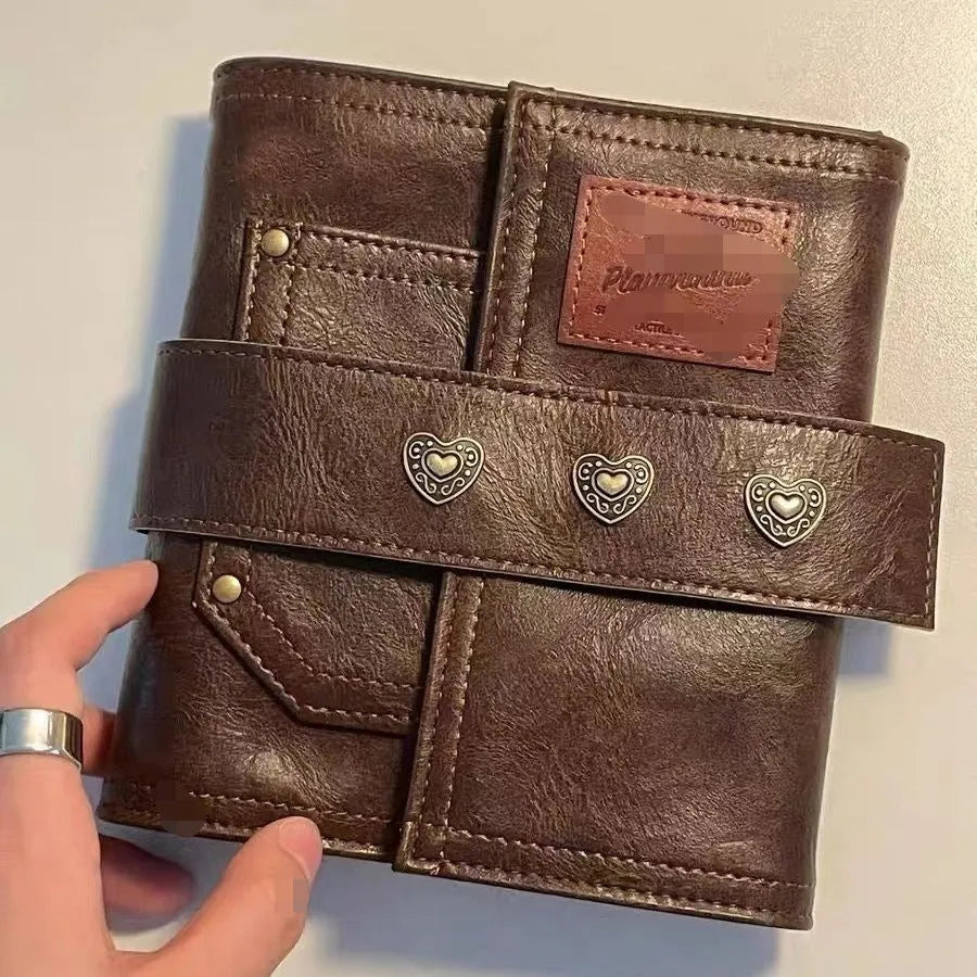 A7 brown PU leather notebook with buckle closure and loose-leaf binder binding