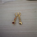 Women's heart-shaped fashion earrings in gold or silver electroplated alloy