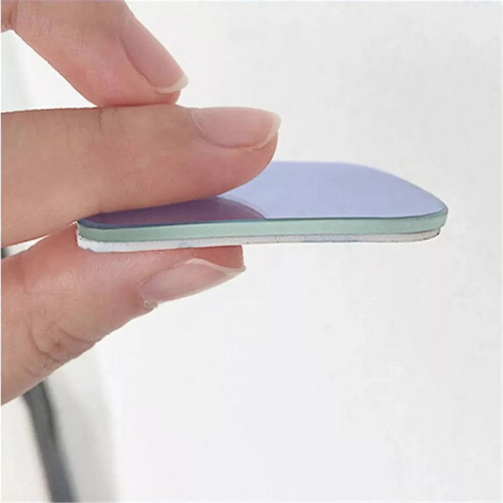 White fan-shaped car blind spot mirror with 360-degree adjustment on universal mounting bracket