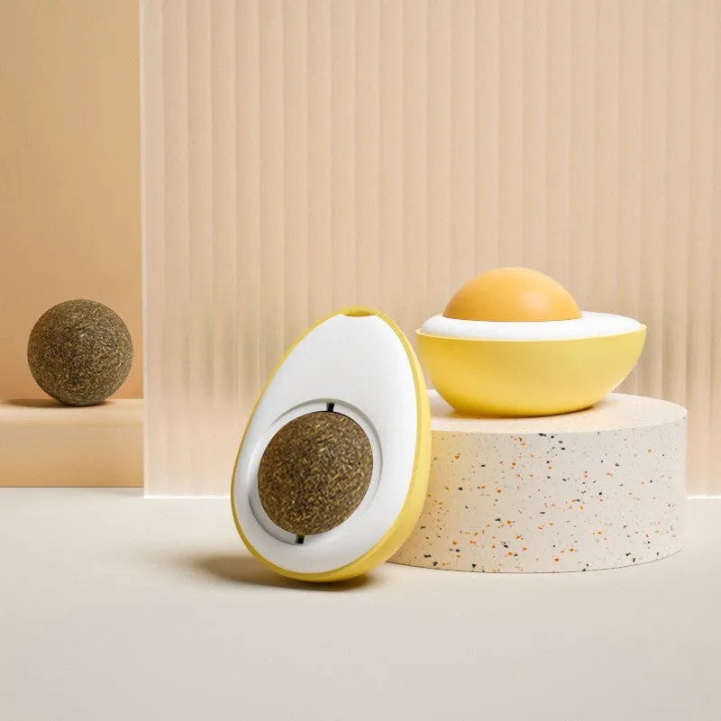 Interactive catnip ball toy with 360 rotation mounted on wall for feline teeth cleaning play
