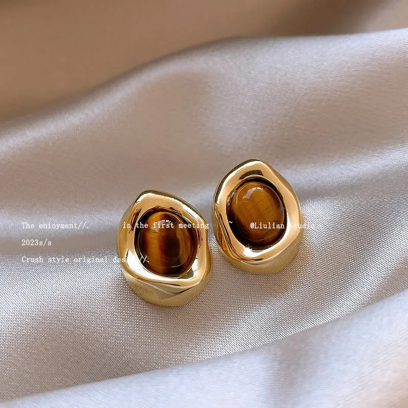 Handmade geometric alloy earrings set showing three styles with electroplating and tassel elements