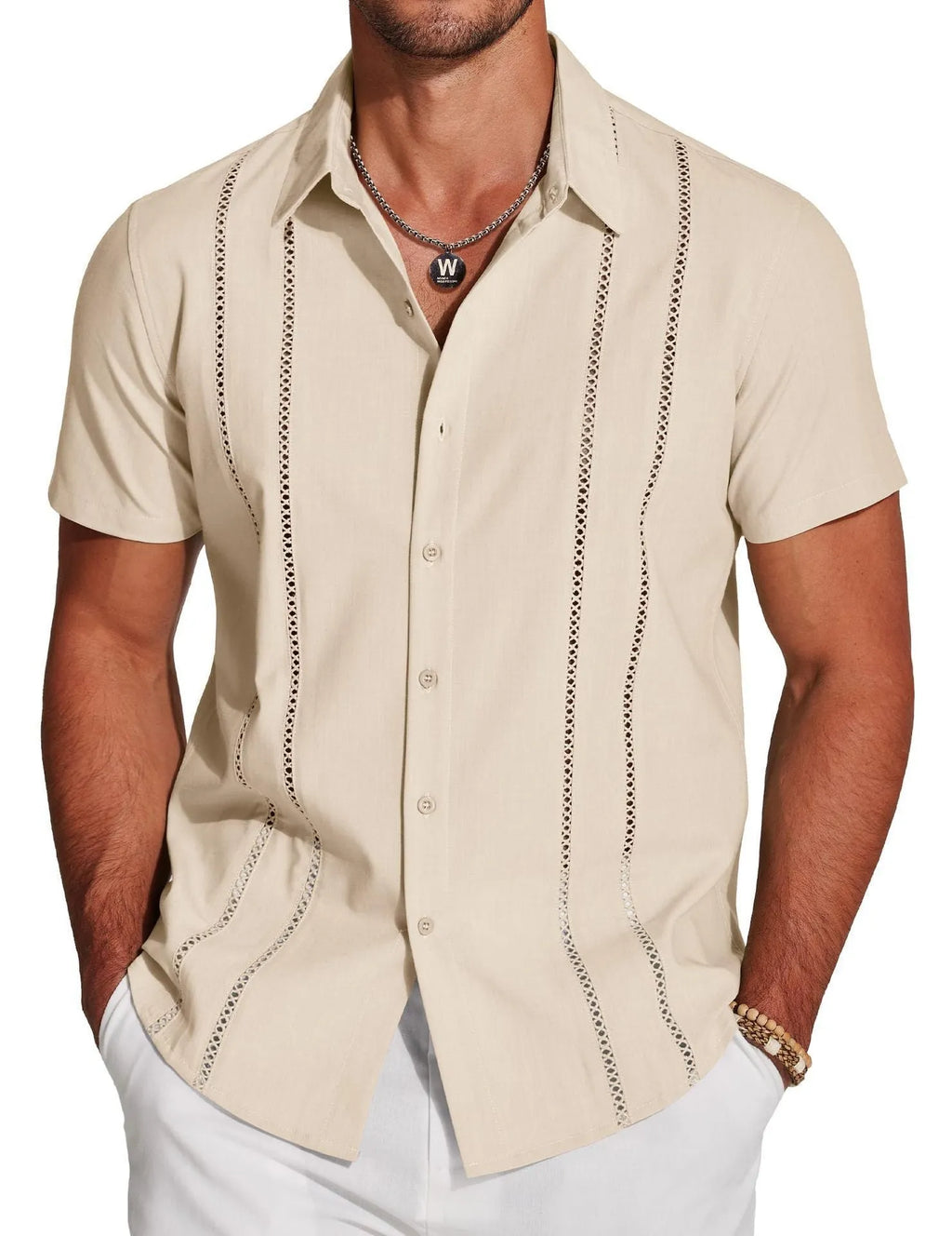 Man wearing a slim fit, short sleeve Hawaiian shirt with a digital print pattern.