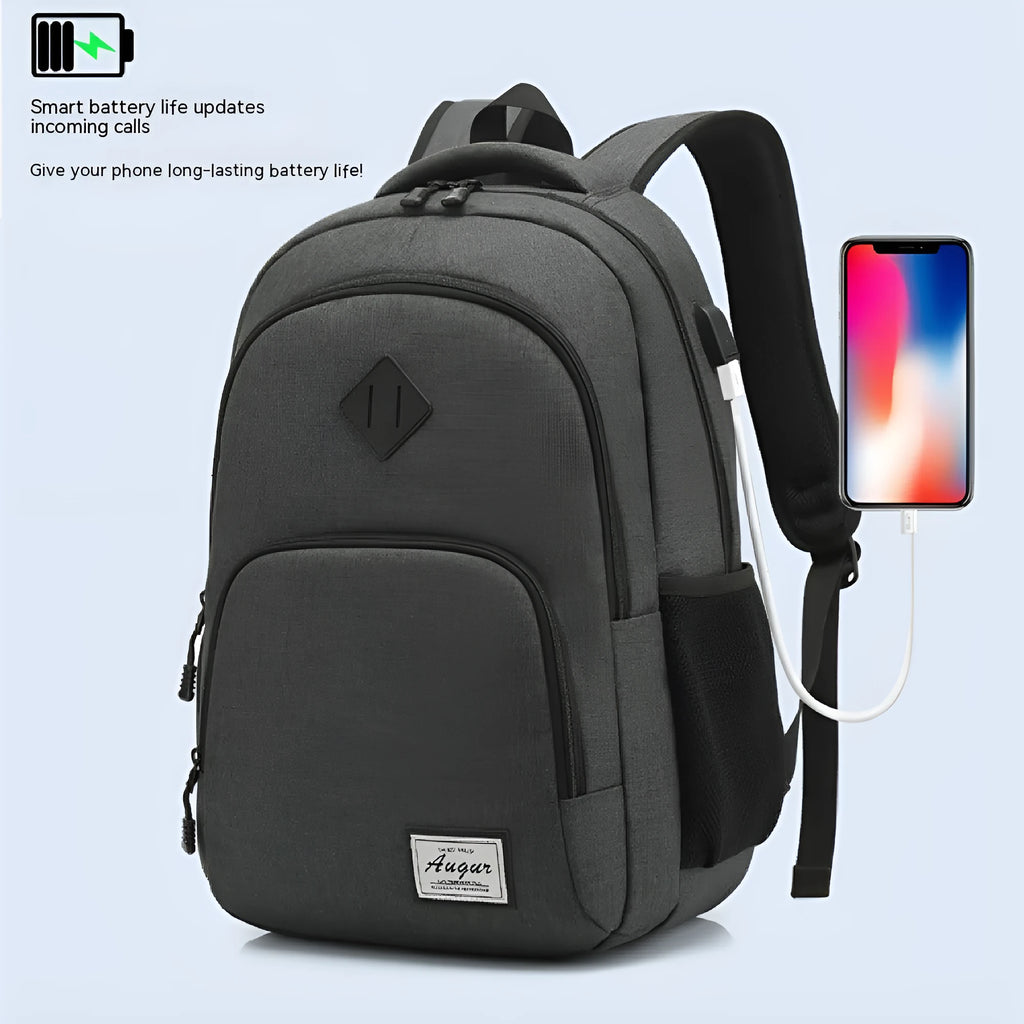 Grey nylon backpack with USB charging port and trolley case strap showing 32x15x46cm dimensions