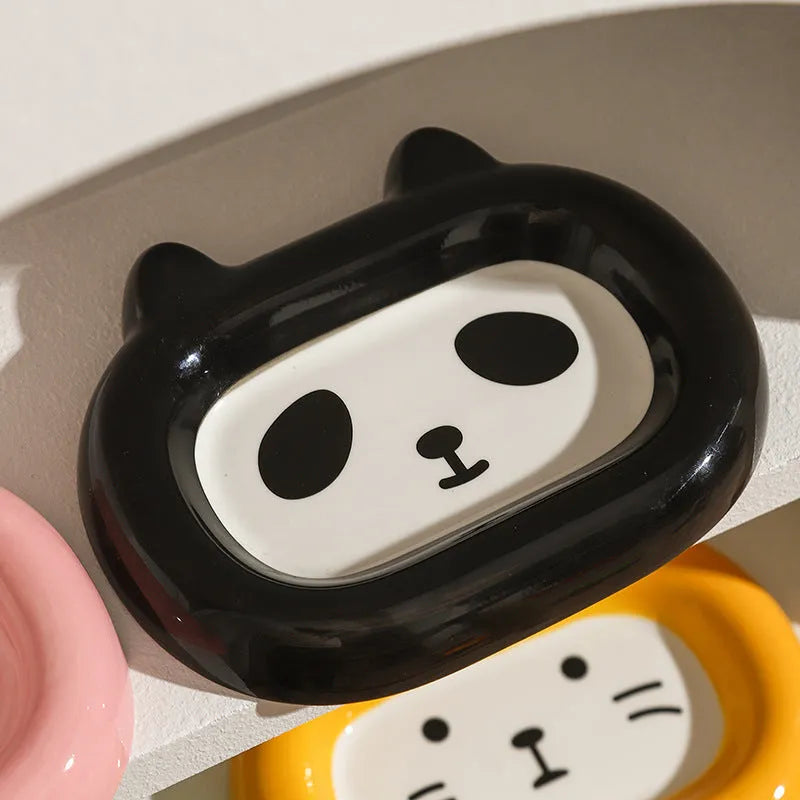 Ceramic pet bowl shaped like a cat, frog, panda, or pig for dry food or water.