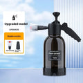 Black 2L foam watering can spray bottle with ergonomic handle and switch lock for car and household use.