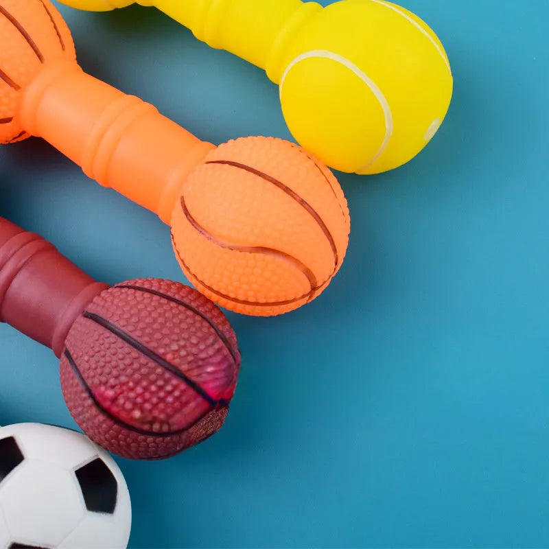 Brown, orange, white, and yellow PVC football dumbbell shaped squeaky dog chew toy.