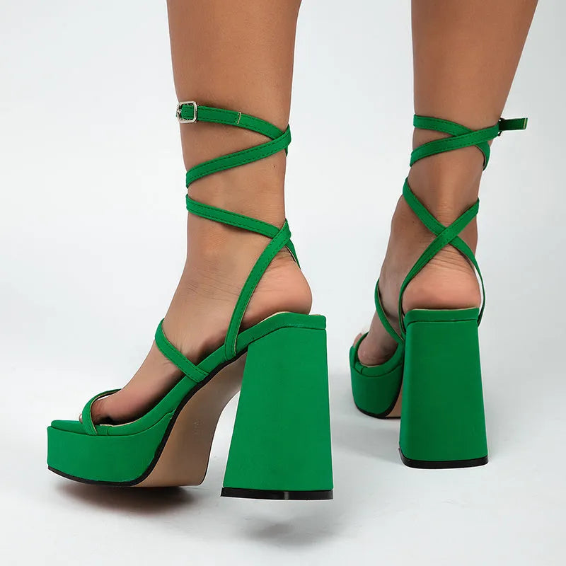 Women's black chunky heel square toe Roman-style PU strap sandals seen from side