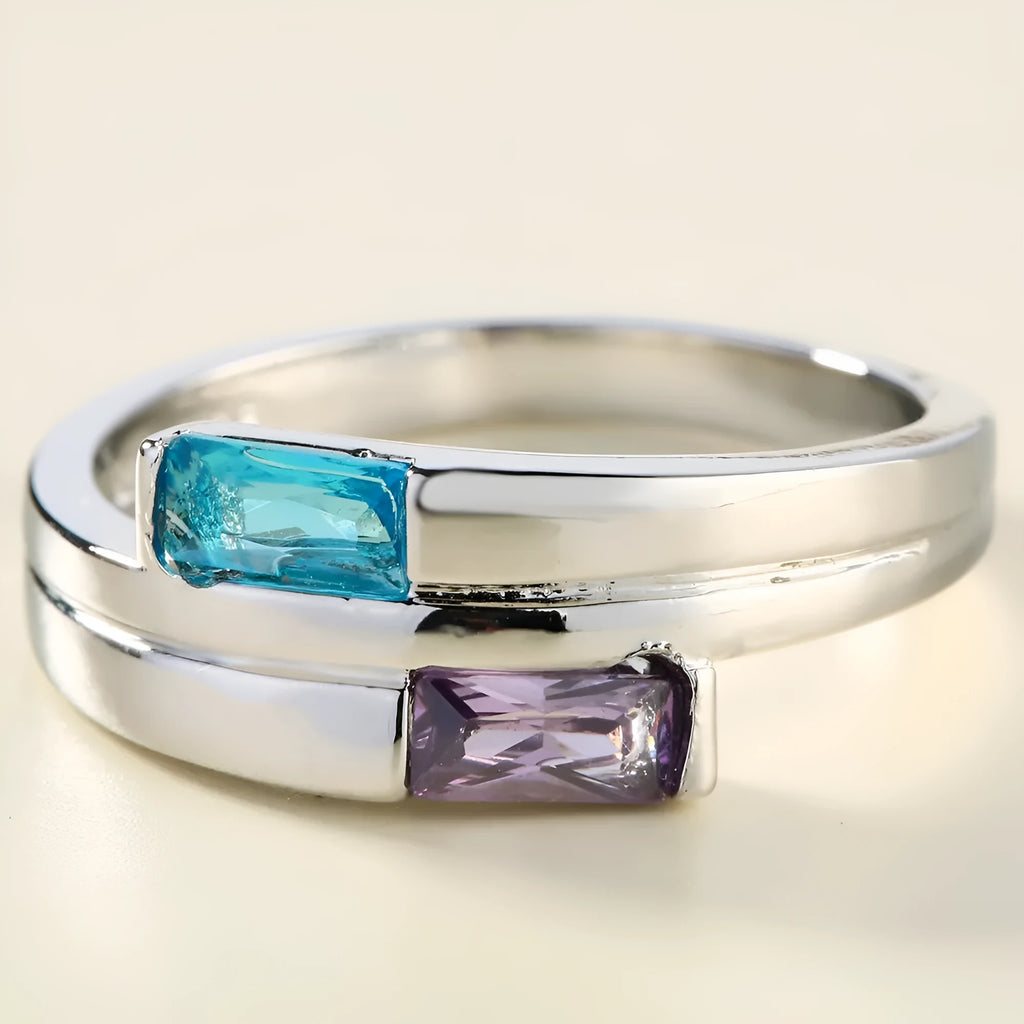 Silver copper ring with zircon inlay showing electroplated finish and contemporary band design