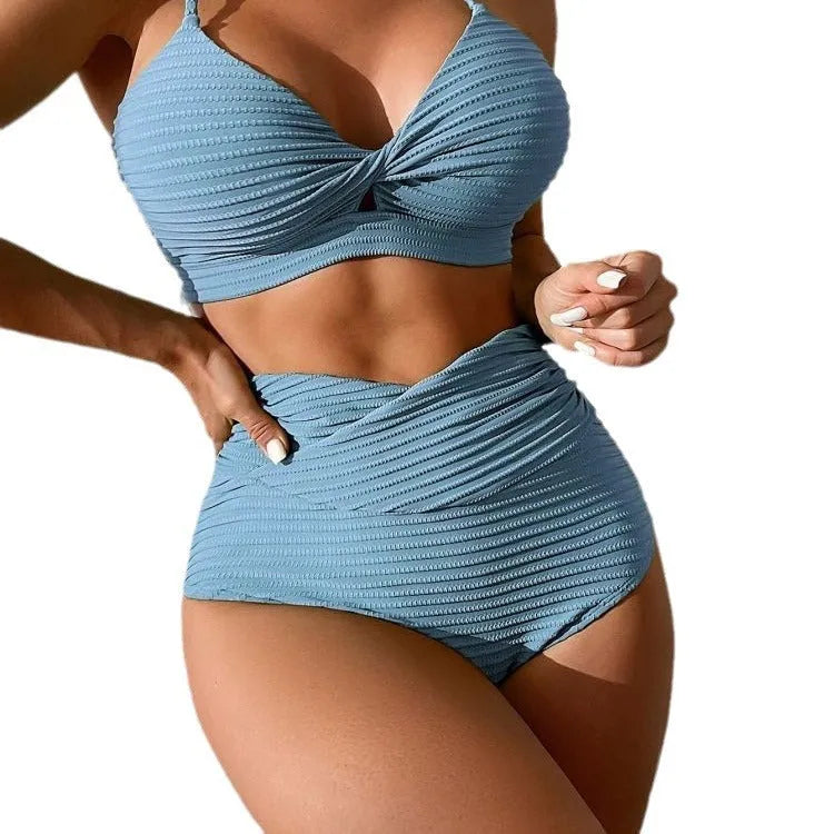Women's solid colour two-piece split bikini swimsuit on a white background.