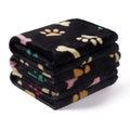 Soft cloth pet blanket with confetti bone and paw print pattern in beige colour on a light background