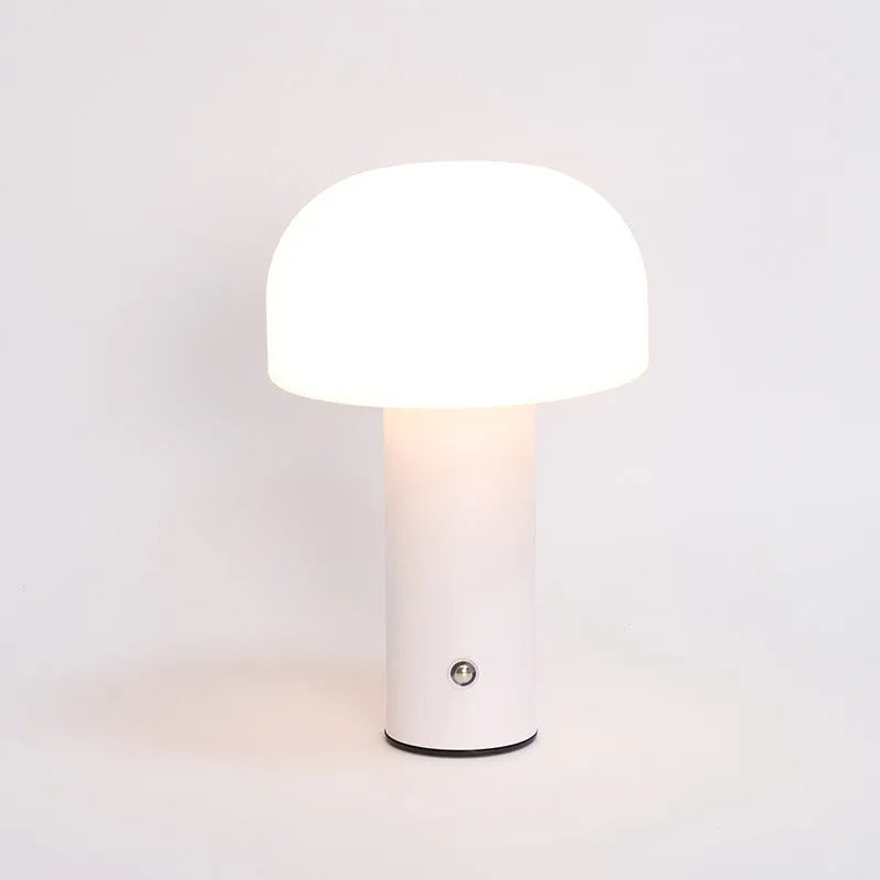USB-powered dual-purpose table lamp with plug-in base in black, white, orange, or green colour options