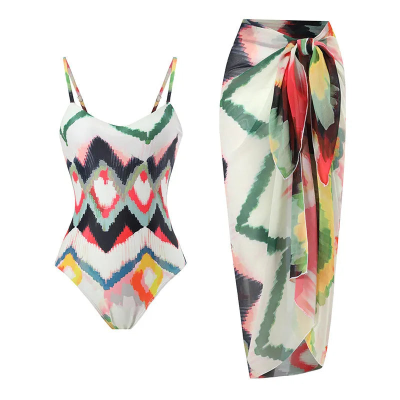 Women's striped two-piece swimsuit with matching hip skirt in gradient print