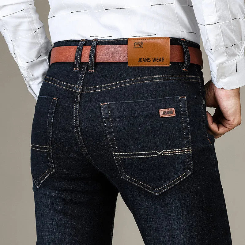 Men's slim fit elastic straight jeans in black cotton denim, full length view