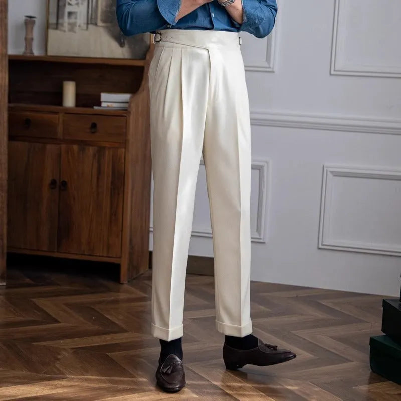 Man wearing black high-waist straight-leg casual polyester trousers for leisure.