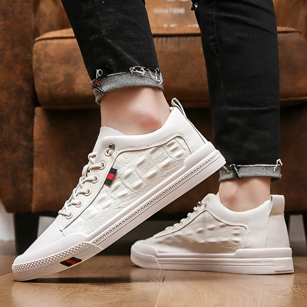 White men's lace-up casual sneakers with round toe and flat rubber sole.