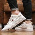 White men's lace-up casual sneakers with round toe and flat rubber sole.