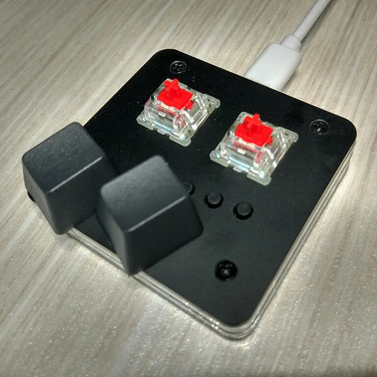 Mini USB keyboard in black with multimedia function keys for audio and game replay controls