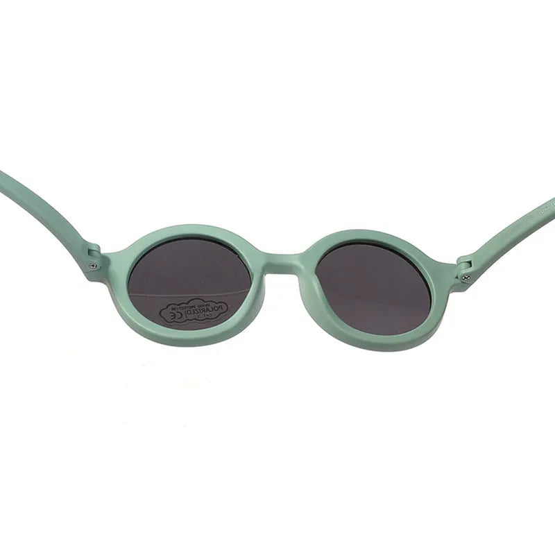 Children's silicone sunglasses with round frames and polarised lenses for 0-3 year old UV protection
