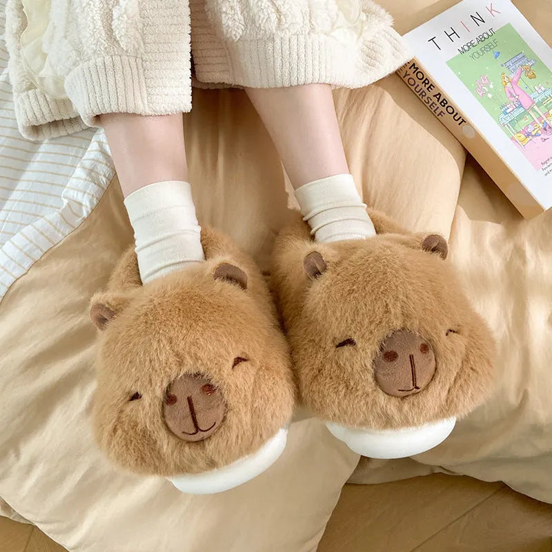 Light brown women's winter plush slippers with artificial wool lining and PVC sole