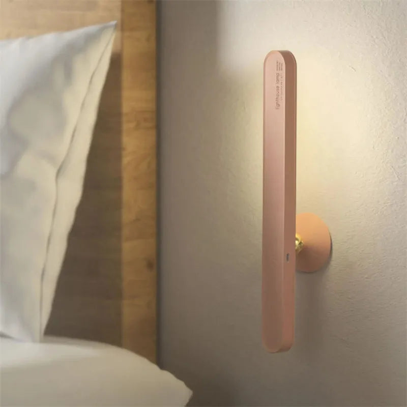 White geometric desk lamp with magnetic suction base and touch control on wooden desk