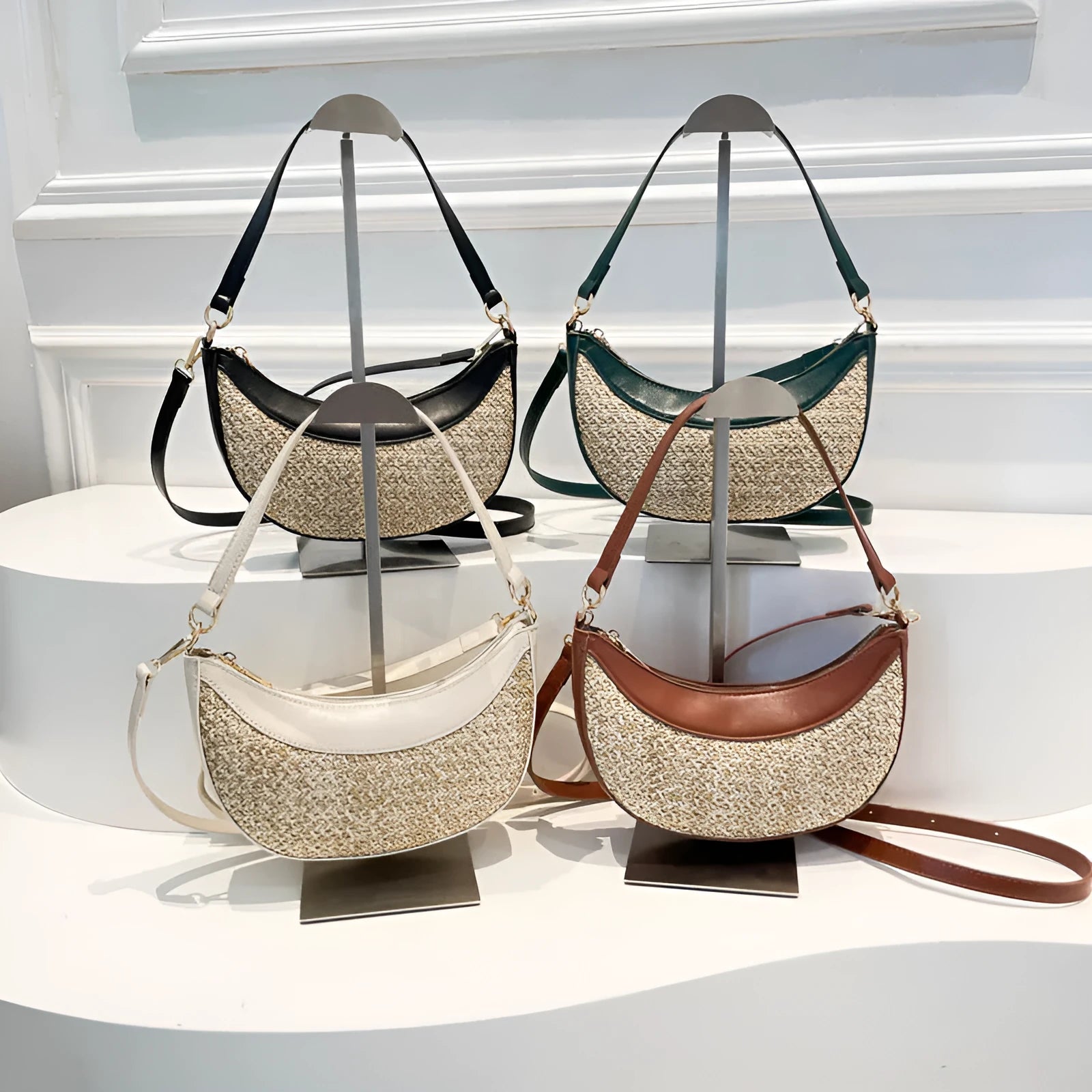 Women's straw crossbody bag with dumpling shape, contrast stitching and single shoulder strap