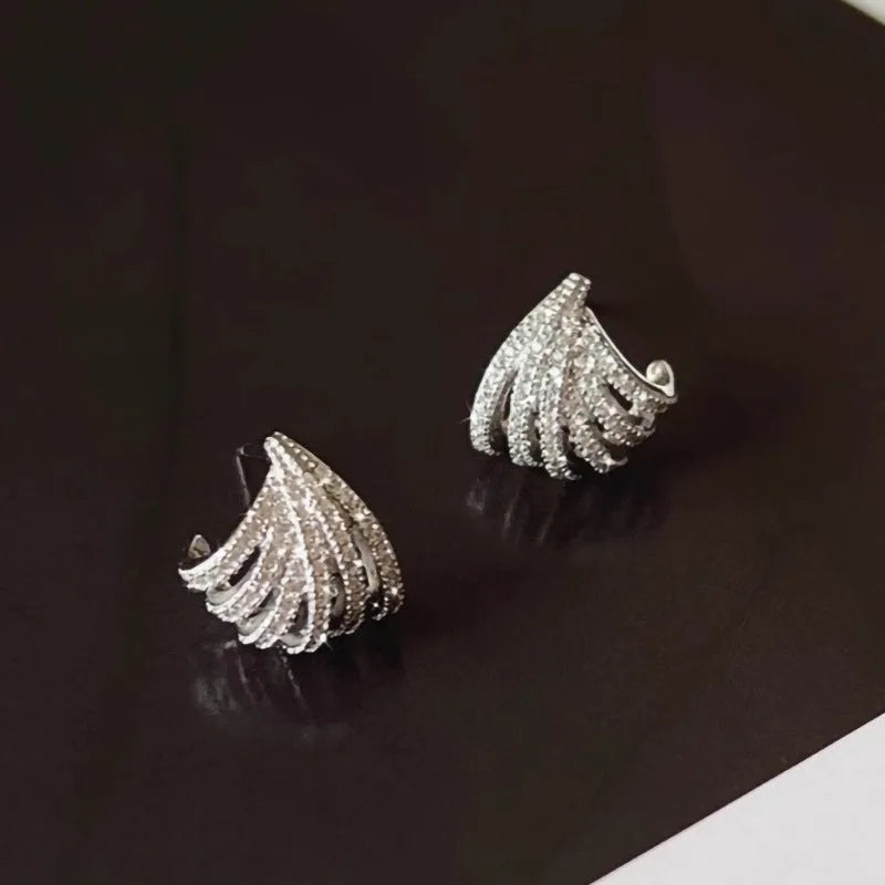 Women's geometric zircon earrings with platinum electroplated finish and clean line design
