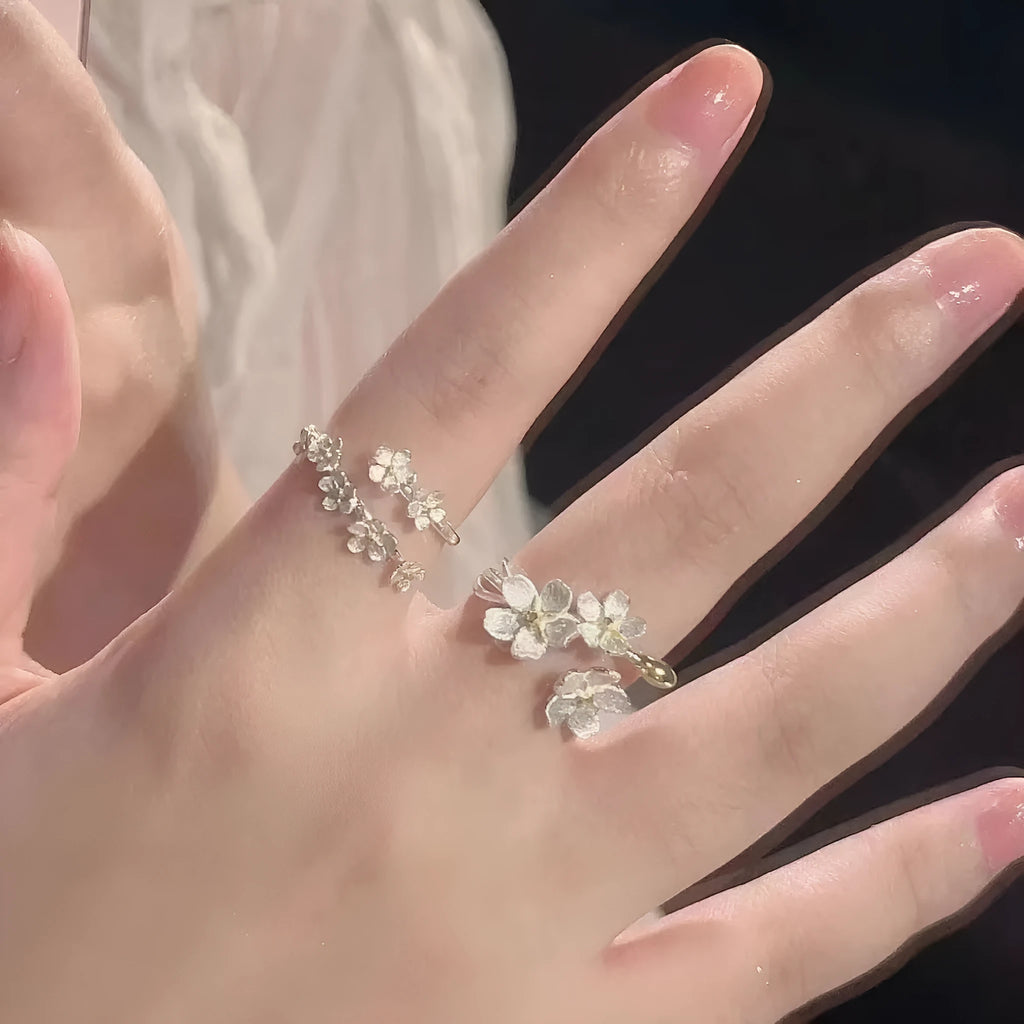Three-dimensional jasmine flower adjustable ring in zinc alloy with floral design