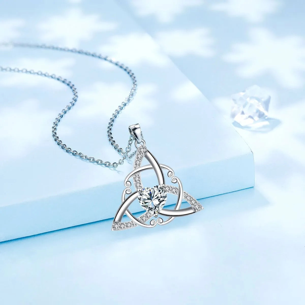 Women's Celtic knot necklace with geometric copper pendant in electroplated finish